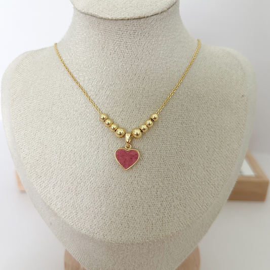 Gold beaded necklace with pink enamel heart pendant worn on neck — Citrika