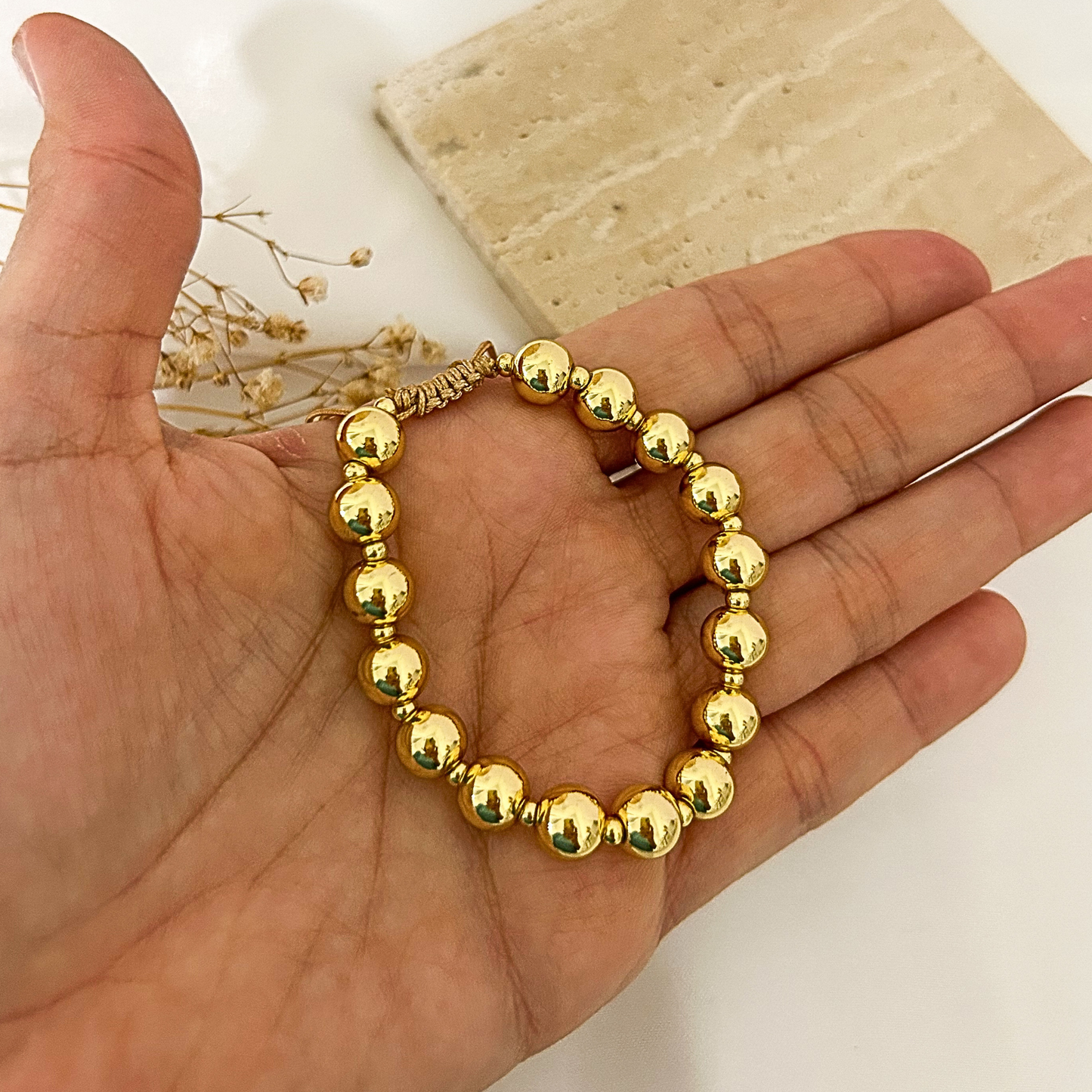 Gold bead bracelet, teddy bear charm bracelet stack