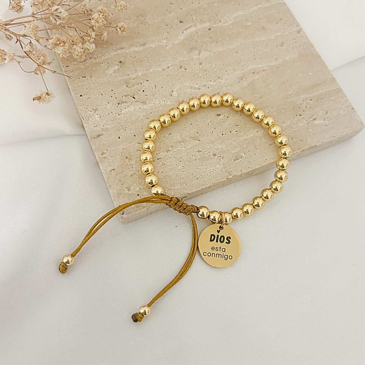 Gold bead faith bracelet with “Dios Esta Conmigo” engraved charm
