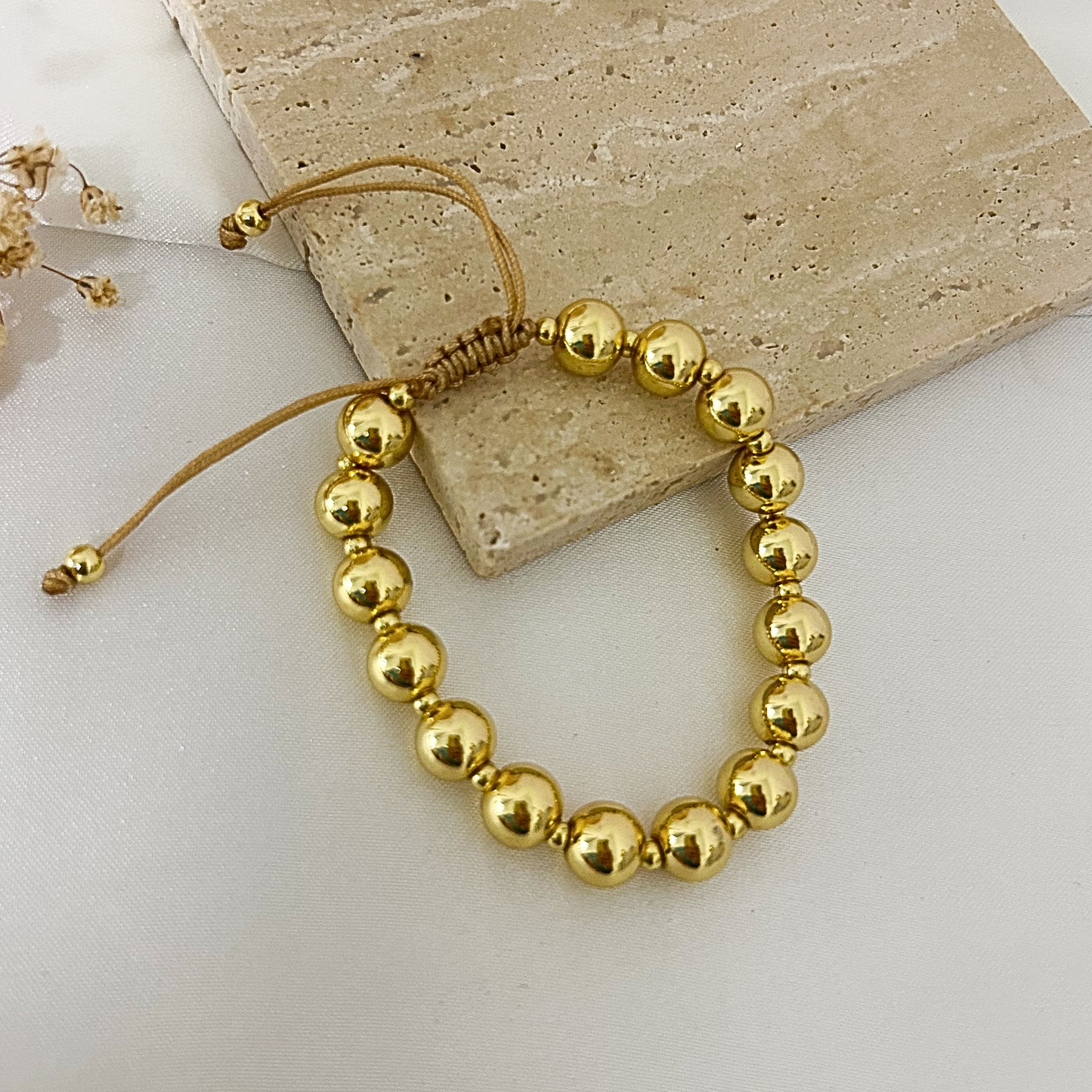 Gold bead bracelet, teddy bear charm bracelet stack