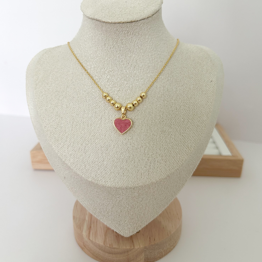 Gold beaded necklace with pink enamel heart pendant worn on neck — Citrika