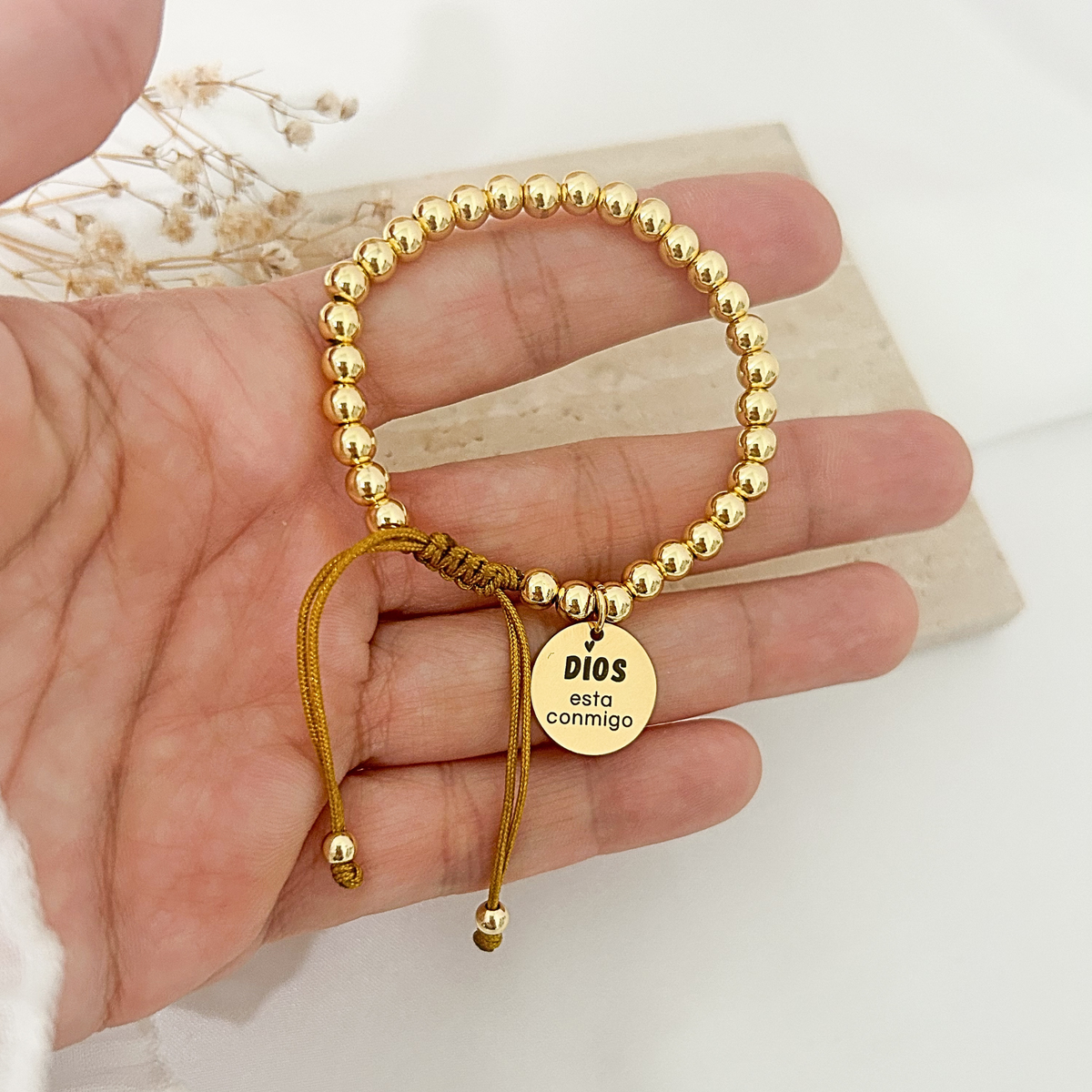 Gold bead faith bracelet with “Dios Esta Conmigo” engraved charm