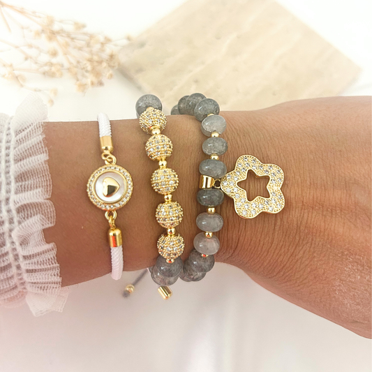 Gray crystal bracelet stack worn on wrist
