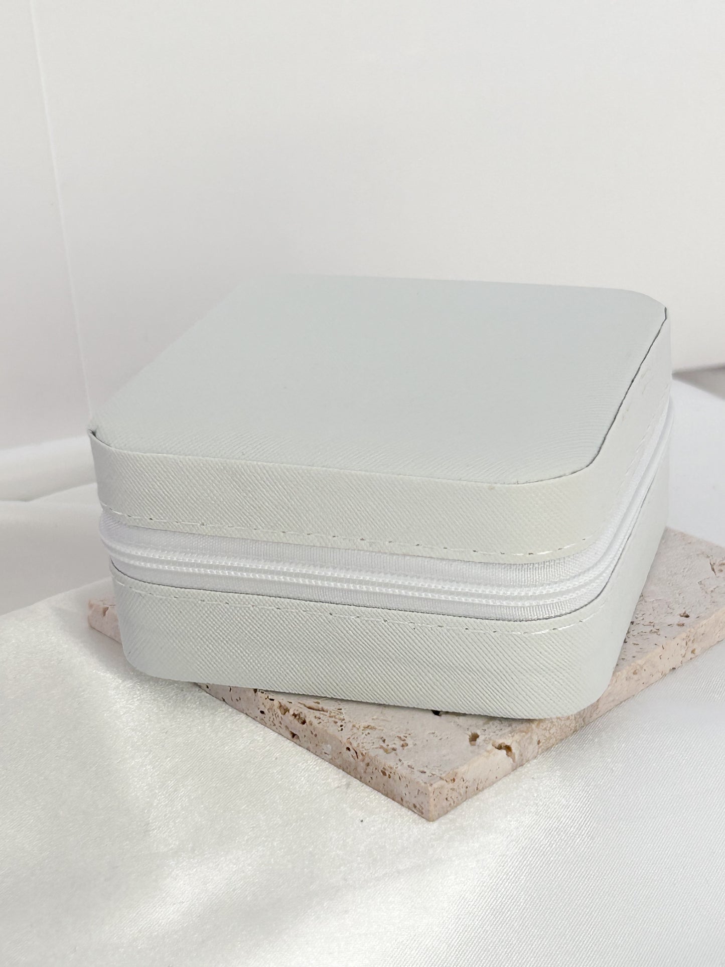 White jewelry box on a light surface