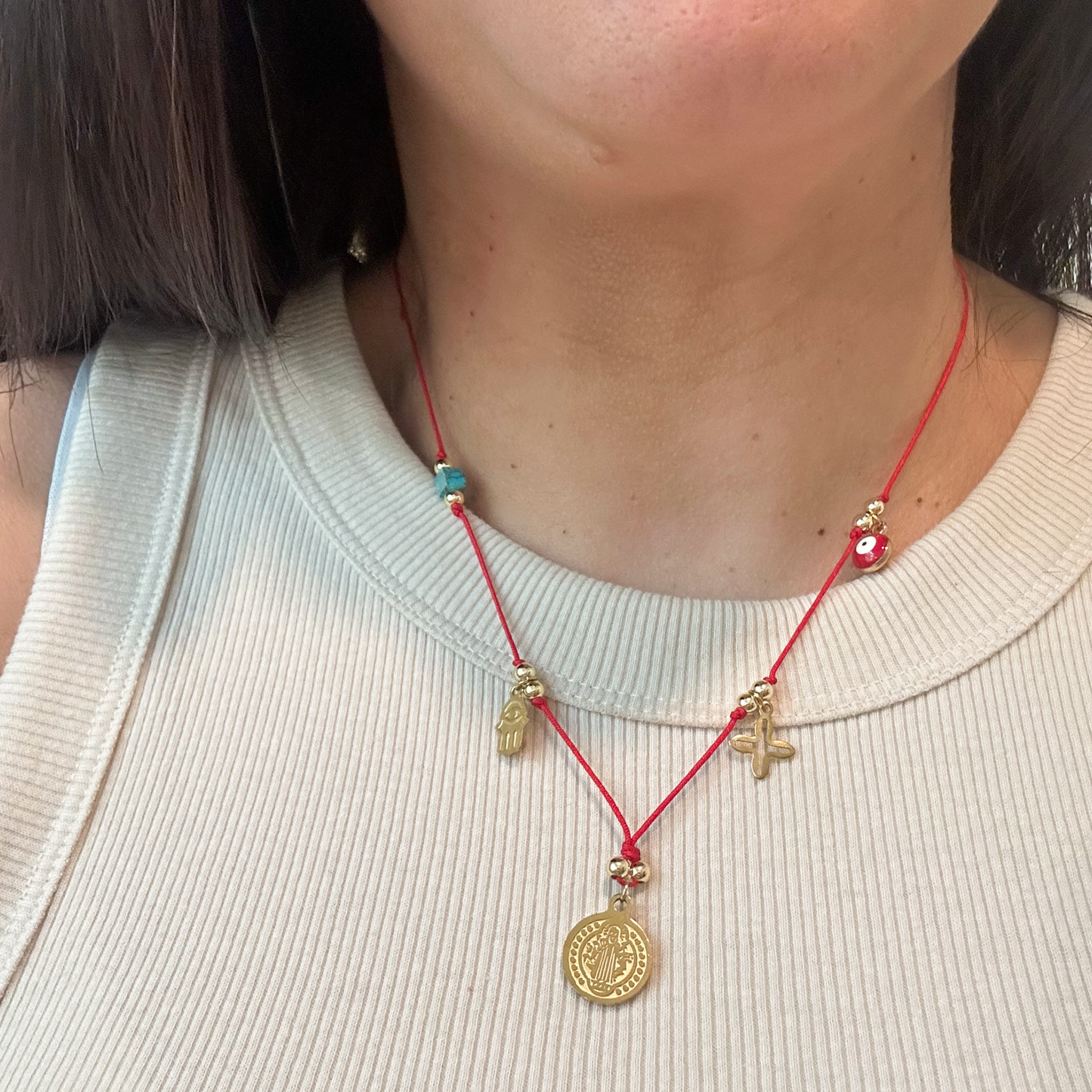 gold saint benedict pendant red cord minimalist necklace