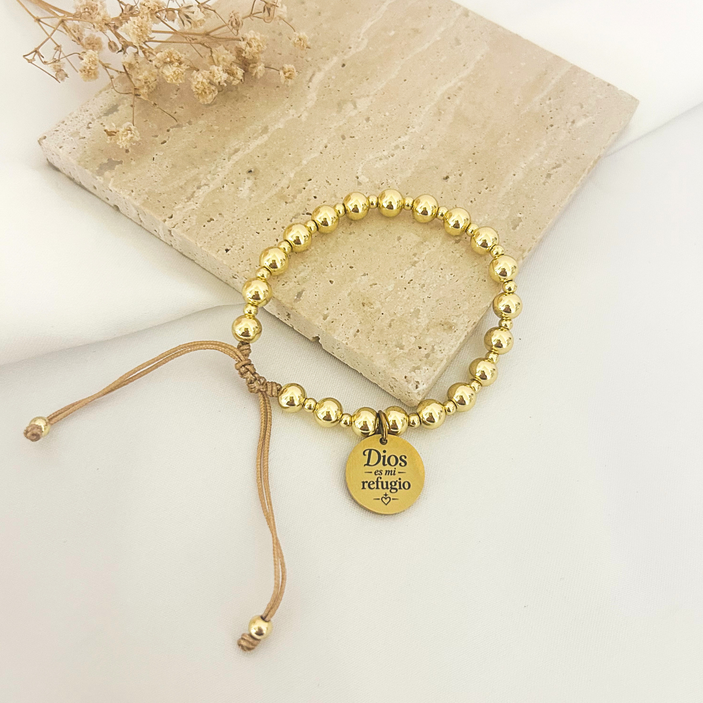 Gold bead bracelet with “Dios Es Mi Refugio” engraved faith charm