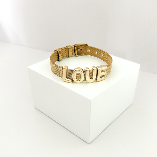 Gold mesh bracelet featuring bold LOVE lettering in a modern and elegant design.