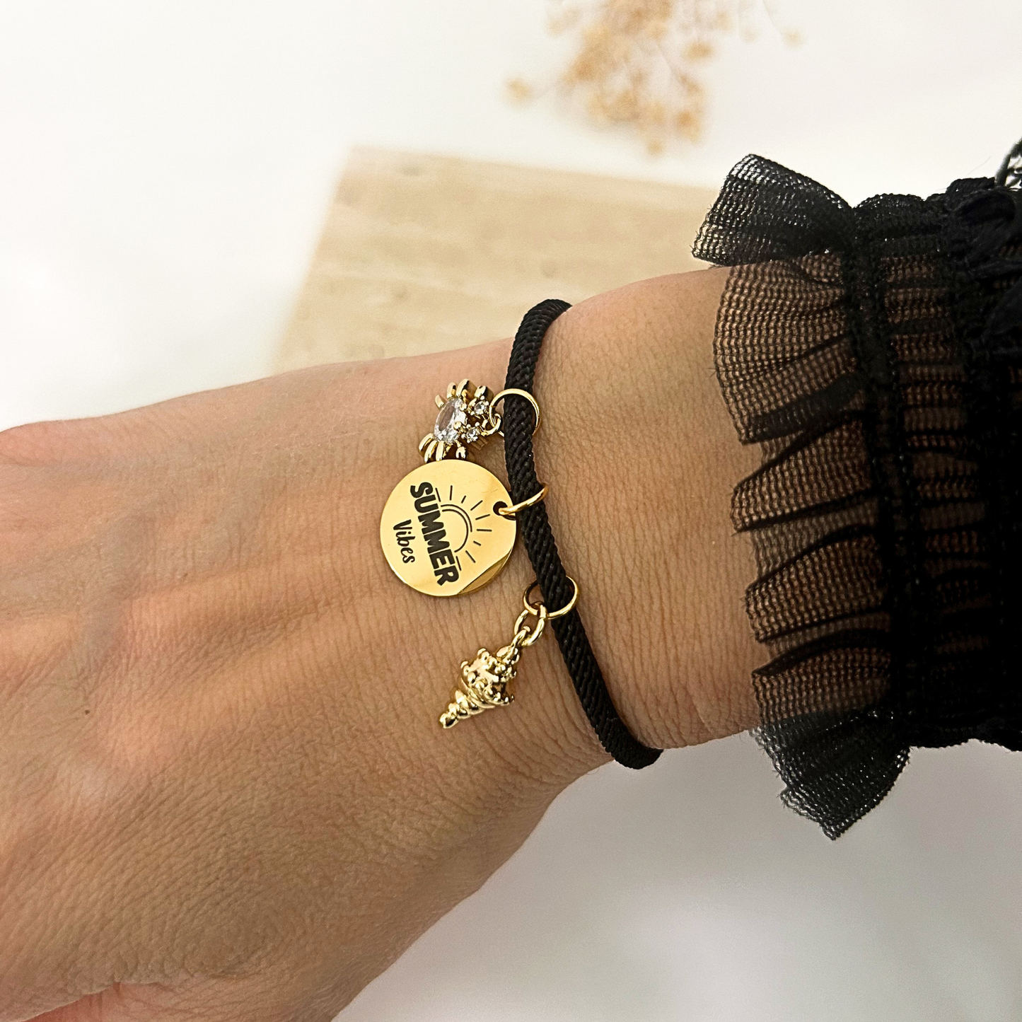Summer Vibes cord bracelet with crab and shell charms