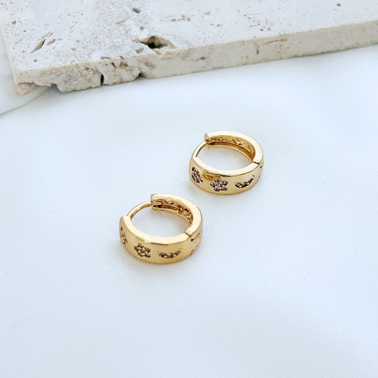 polished gold huggie earrings smooth sleek small hoop design