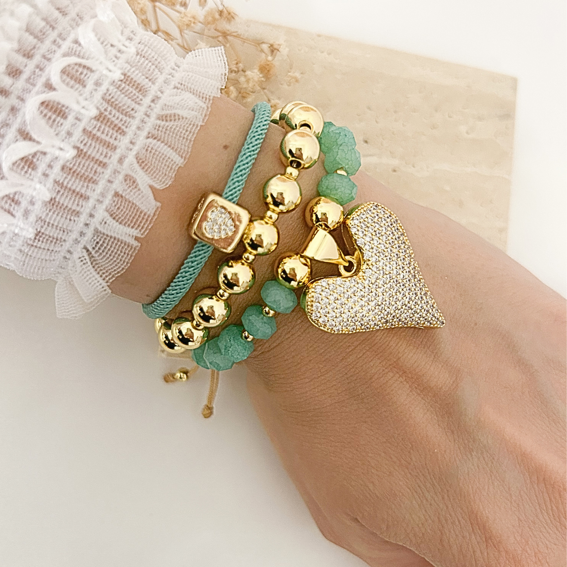 Mint heart bracelet set with mesh cord, gold bead, and heart pendant styles