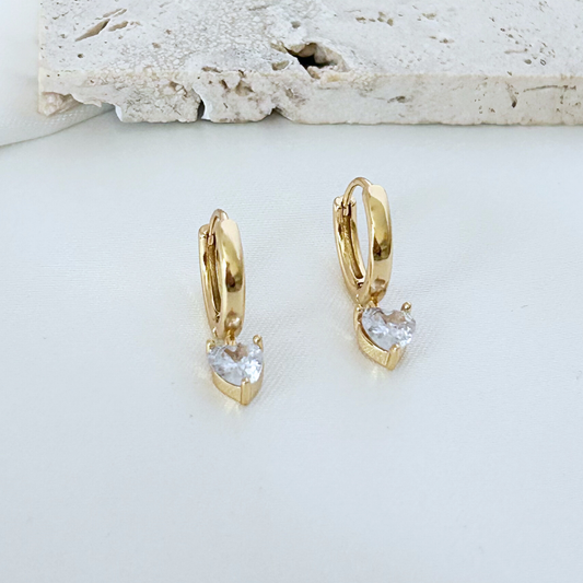 gold huggie earrings with small heart drop delicate feminine style