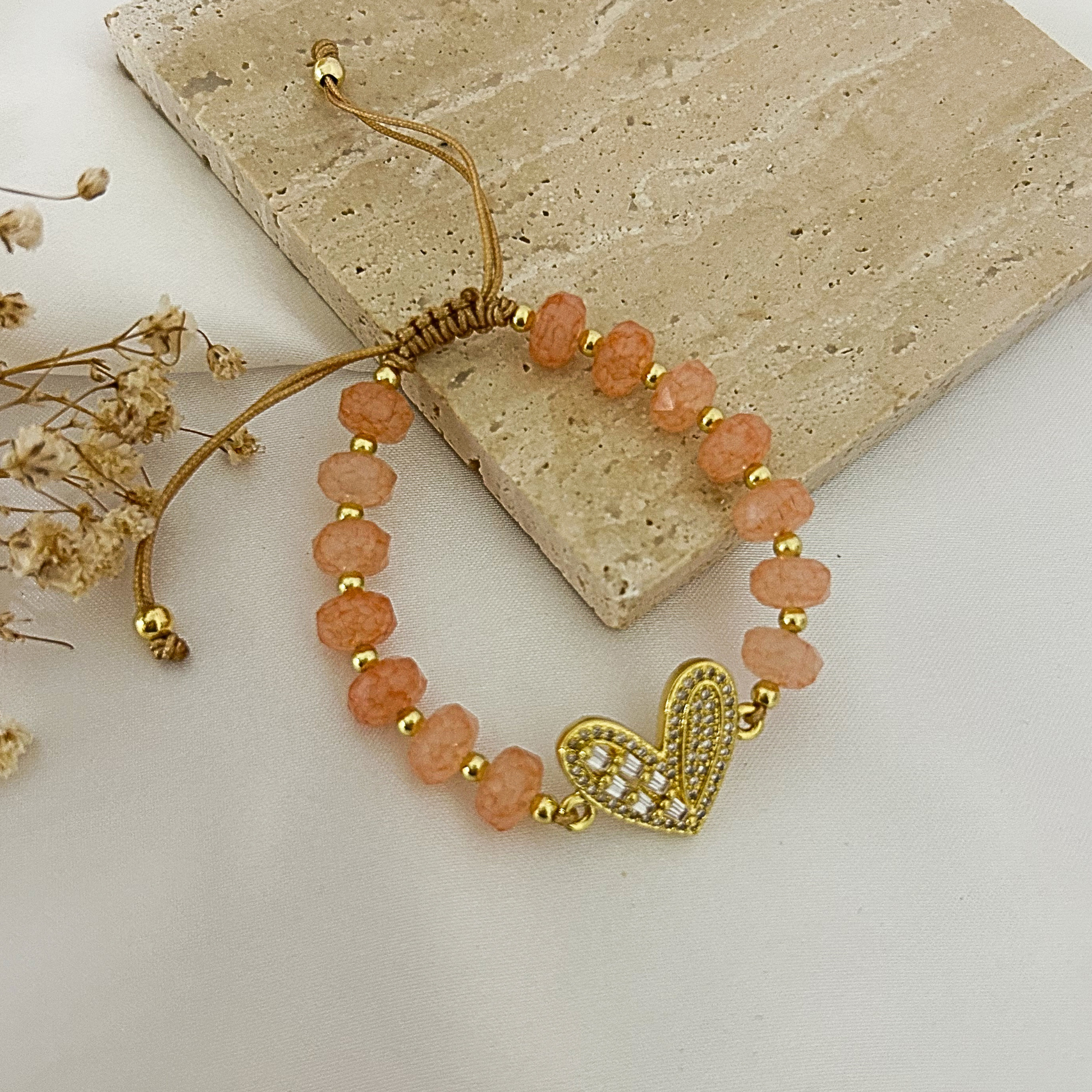 Peach crystal bracelet with pavé heart charm