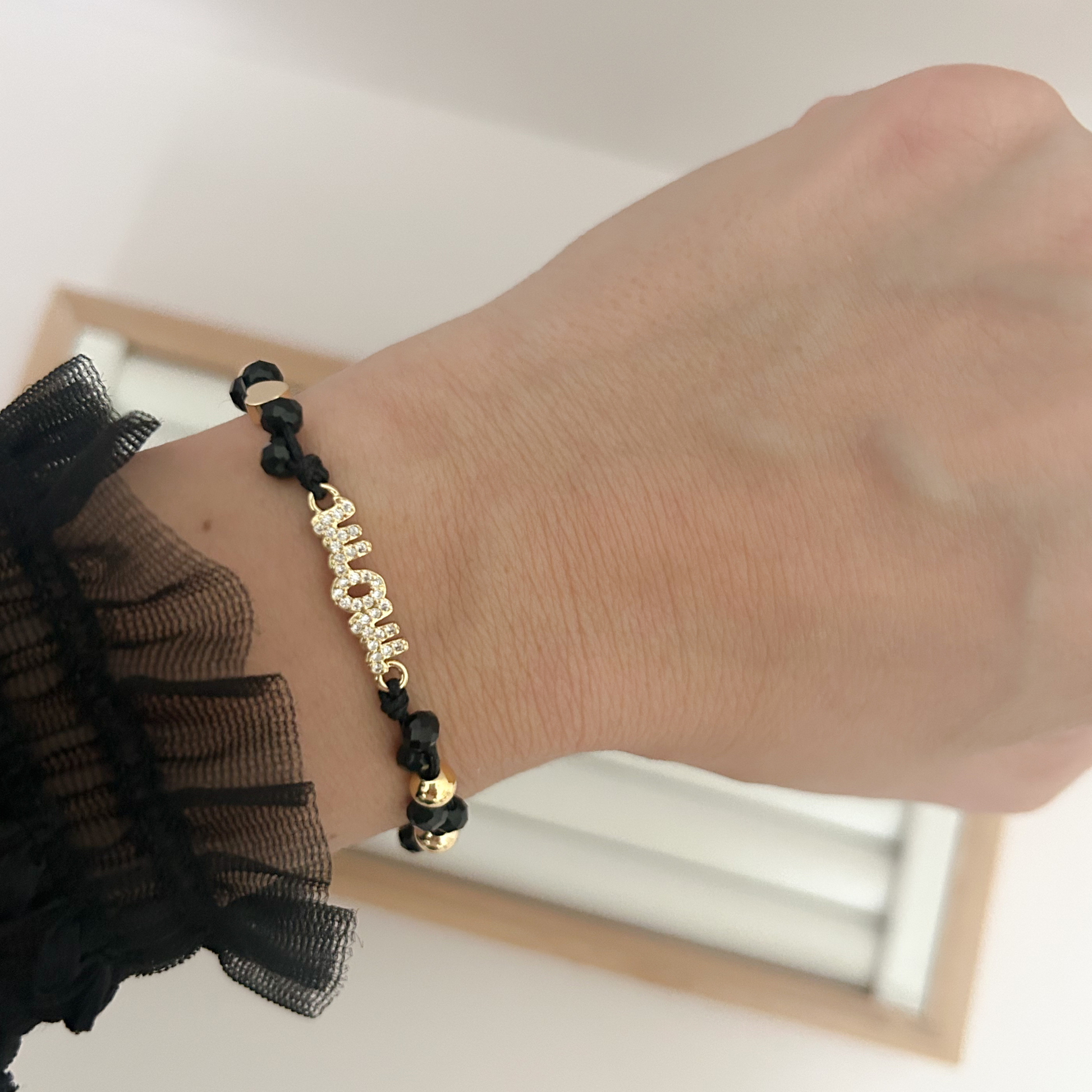 adjustable black bracelet, trendy bead bracelet aesthetic, modern gold bead bracelet, chic black jewelry accessory, stylish bracelet gift for her