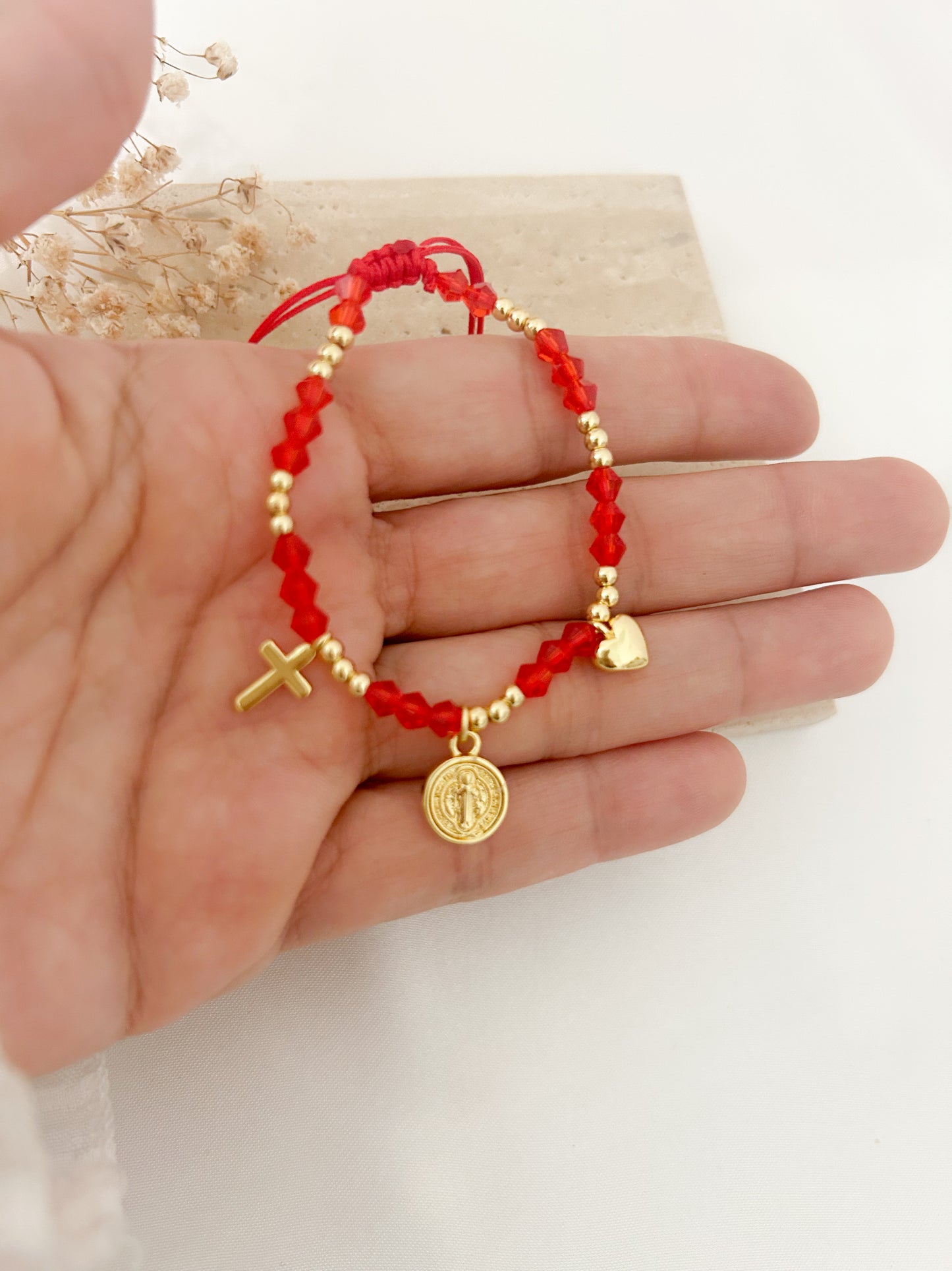 Red San Benito bracelet with crystal beads, cross charm, and heart charm