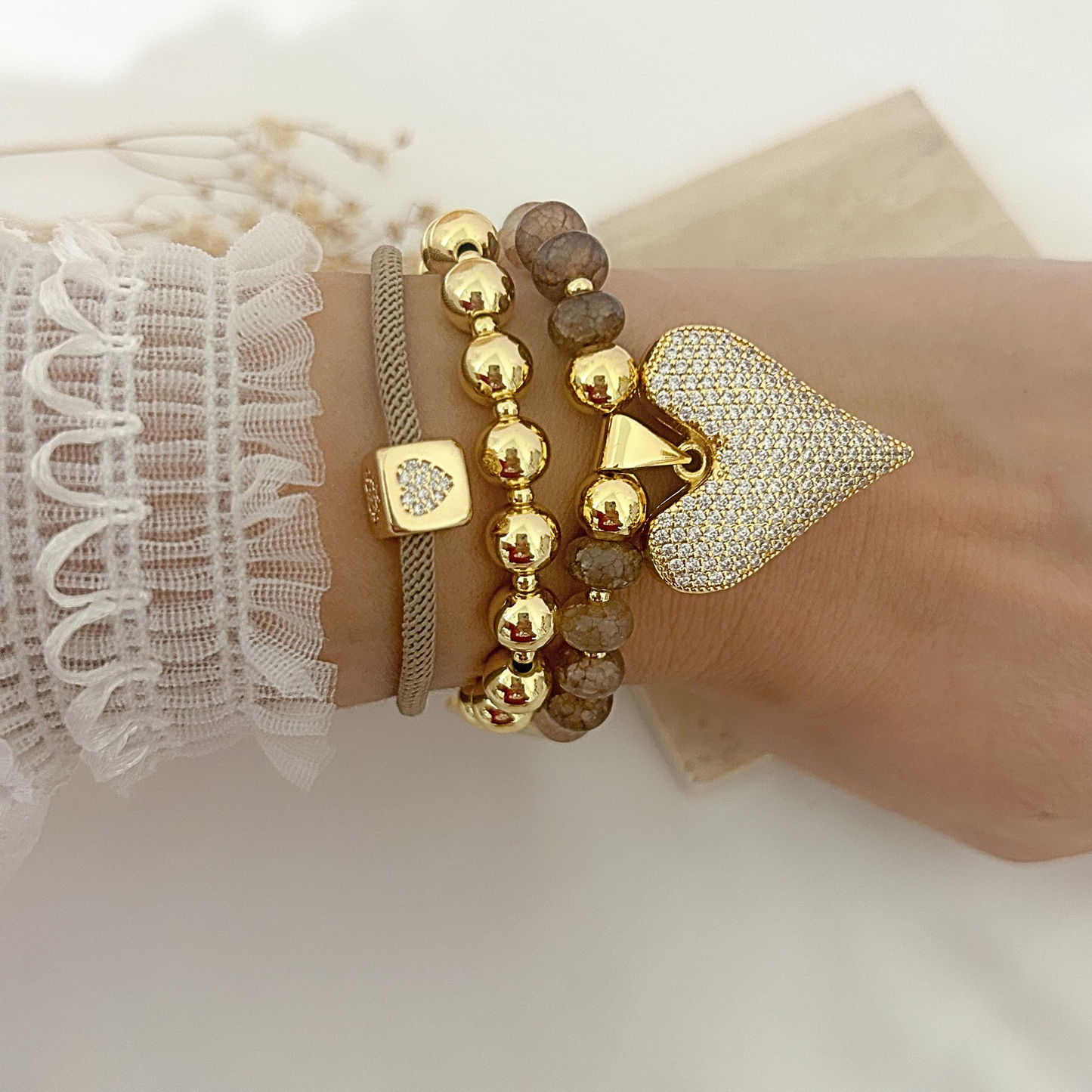 “Held By Grace” stacked bracelet set with mesh cord, faith charm, and pavé heart pendant