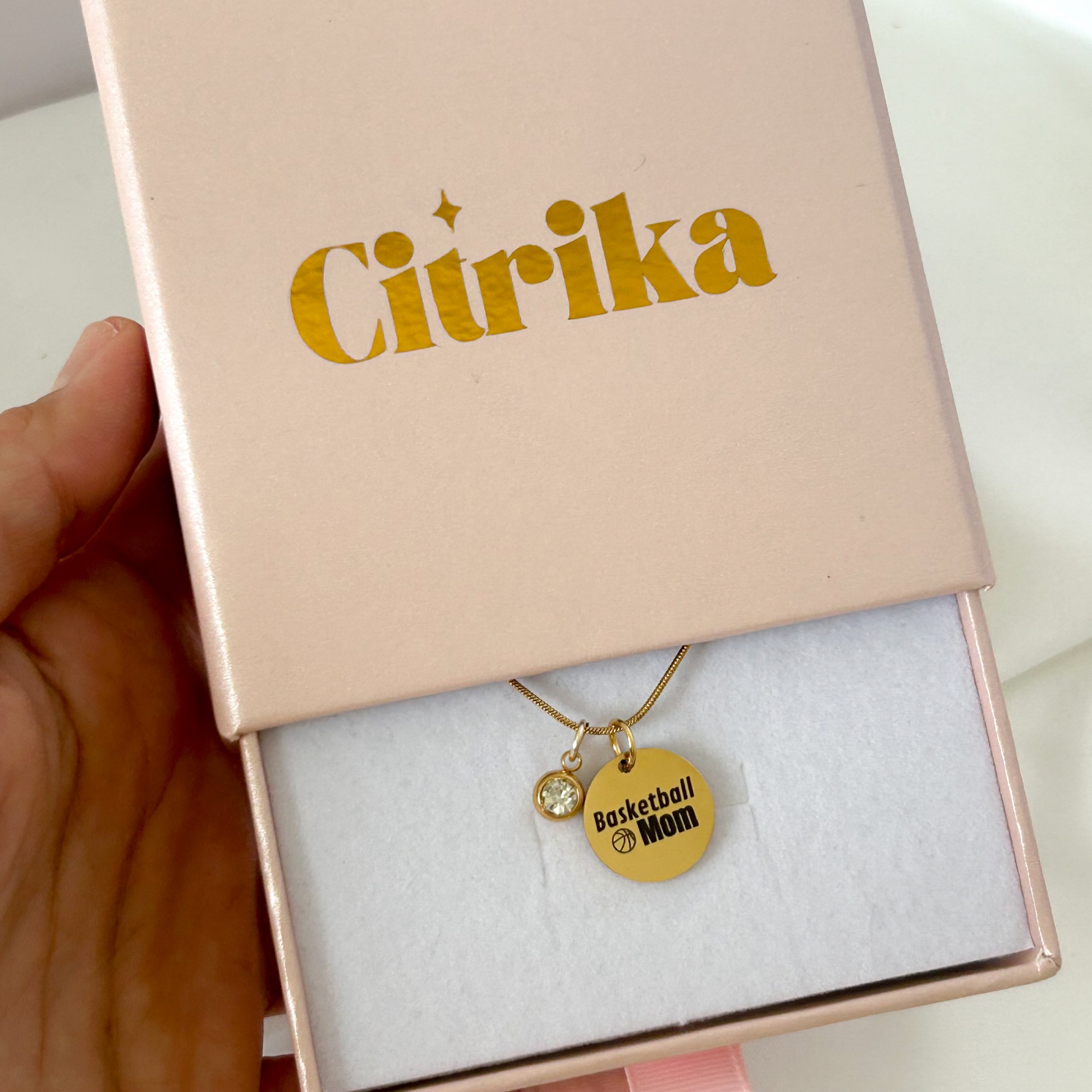Gold necklace with 'Basketball Mom' pendant in a Citrika box